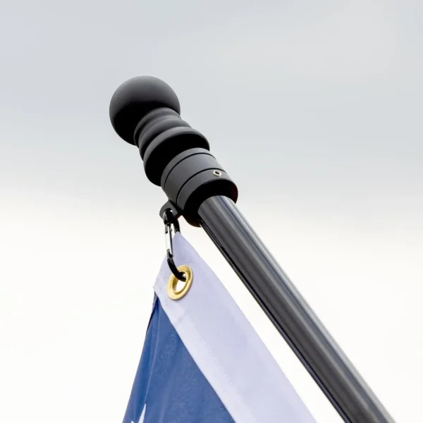 Black flag pole top